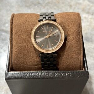 Women’s Micheal Kors Stainless steel watch Rose gold crystal embellishment halo